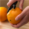 Mercer Culinary citrus peeler creating wide cocktail garnish strips