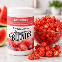 Gold Medal Watermelon Signature Blends 1 lb 4 oz jar with watermelon flavored gourmet popcorn