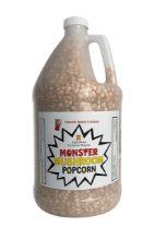 Clear plastic jug filled with Gold Medal Premium Hybrid Monster Mushroom popcorn kernels with white screw cap and product label.
